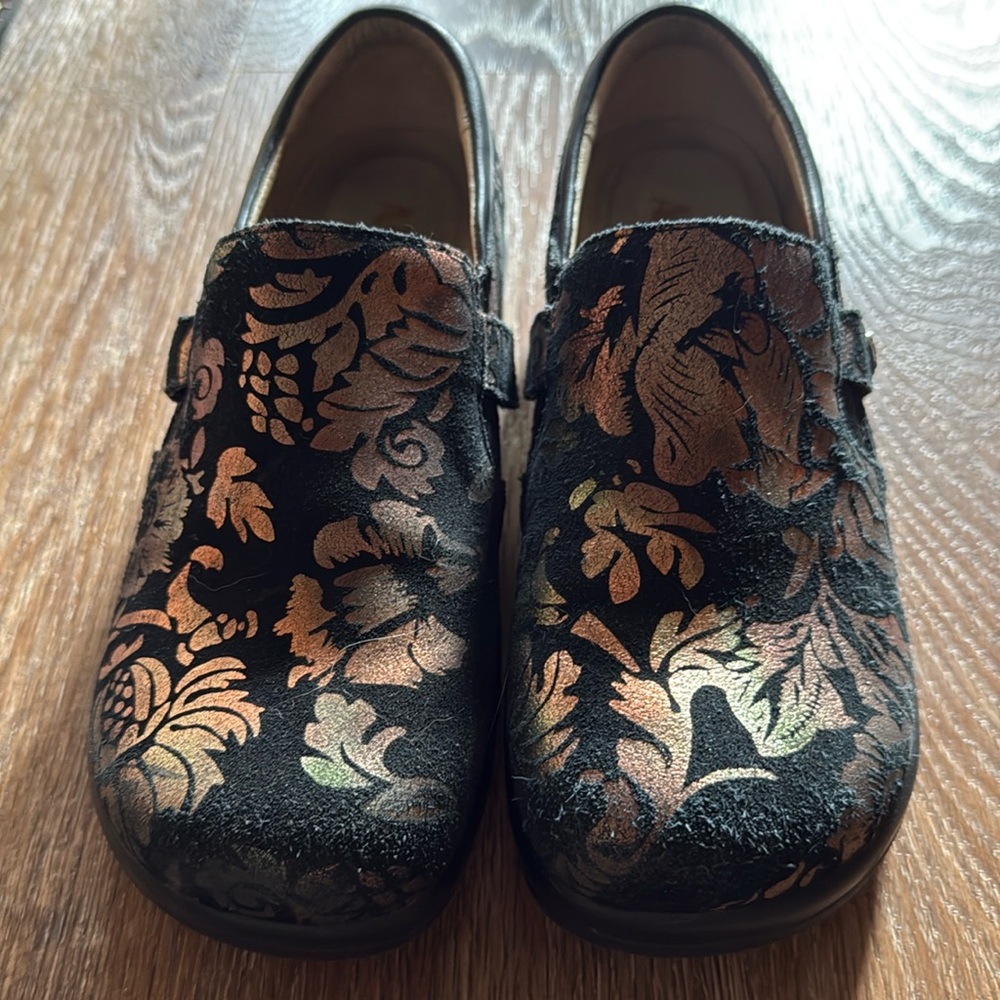 Gently used loafers with iridescent floral patterns, green and orange iridescenc
